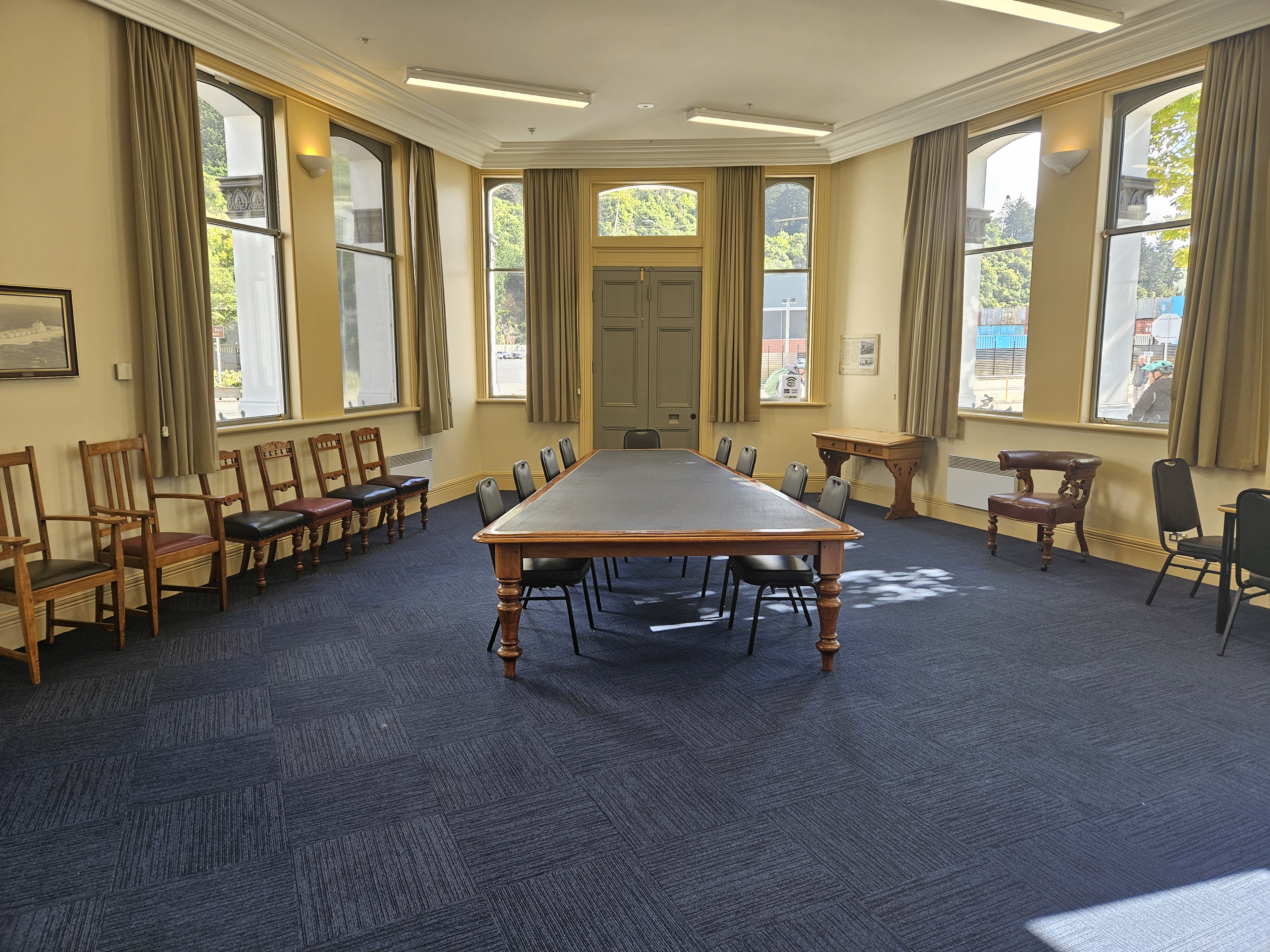 A bright room with tables and chairs